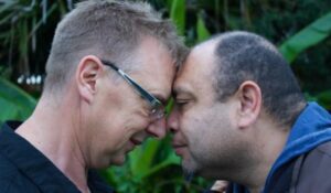photo of two men giving a hongi
