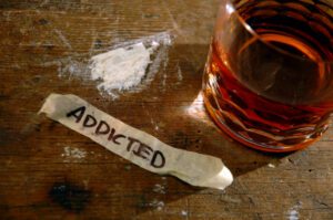 photo of dink and drugs with word addicted